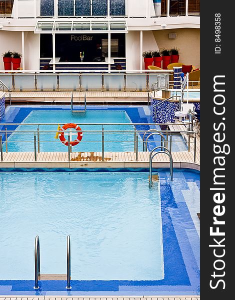 A nice swimming pool on the deck of a luxury swimming pool. A nice swimming pool on the deck of a luxury swimming pool