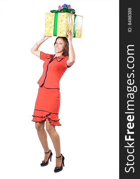 The young beautiful girl with a gift box on a white background