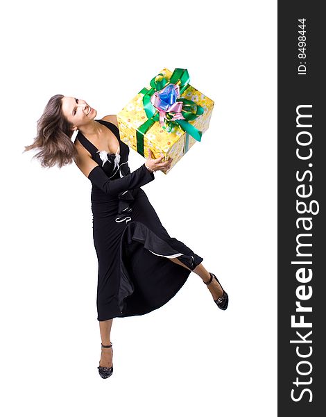 The young beautiful girl with a gift box on a white background