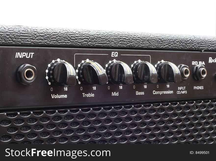 Close up of the controls on a guitar amp. Close up of the controls on a guitar amp