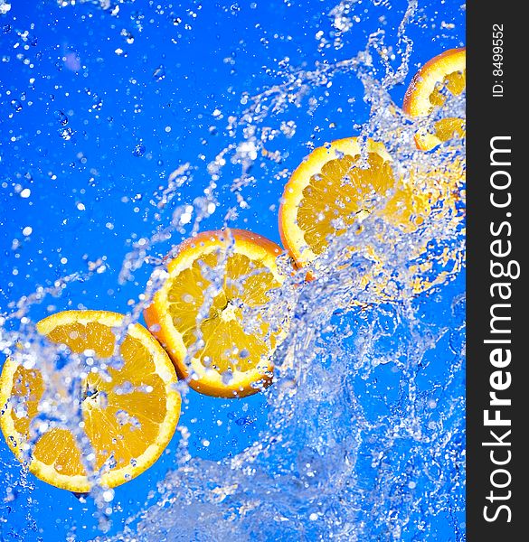 Orange with creative splashing water
