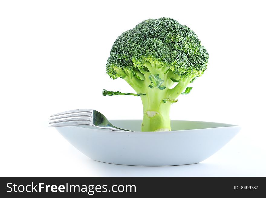 Broccoli and a fork in a bowl