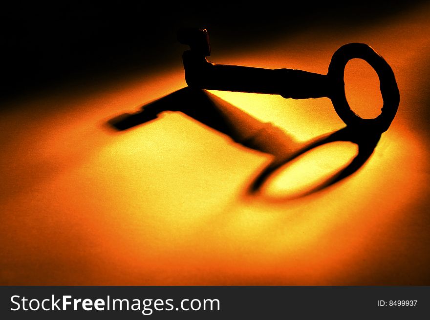 Close up of an old key in golden light