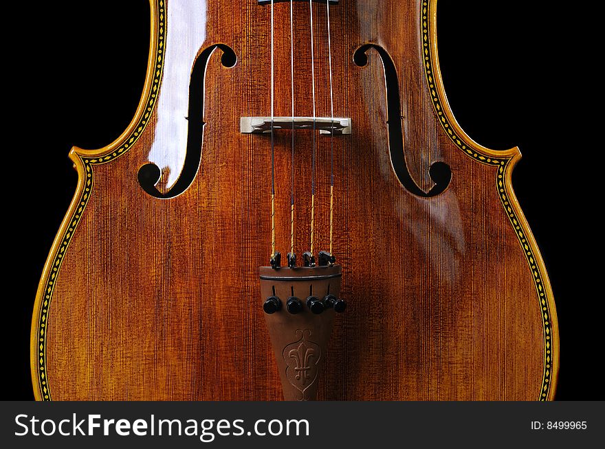 Beautiful cello over a black background. Beautiful cello over a black background