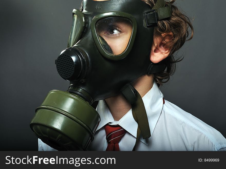 Businessman with gas mask on face