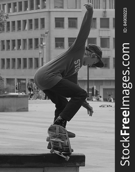 Boy Skateboarding Grayscale Photography