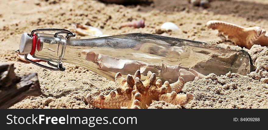 Message in a Bottle on Sand