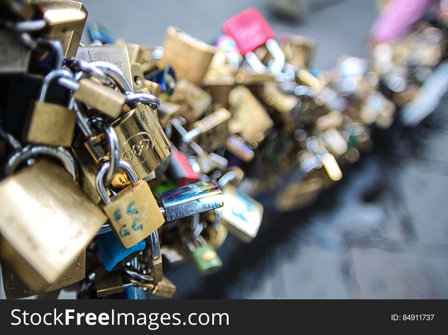 A close up of a bunch of love padlocks.