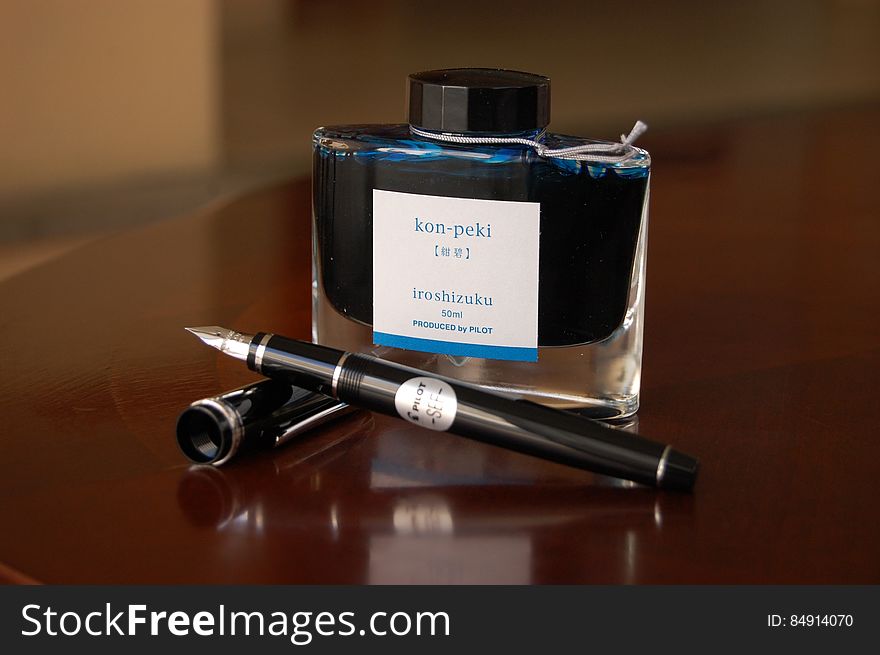 Fountain pen and ink bottle
