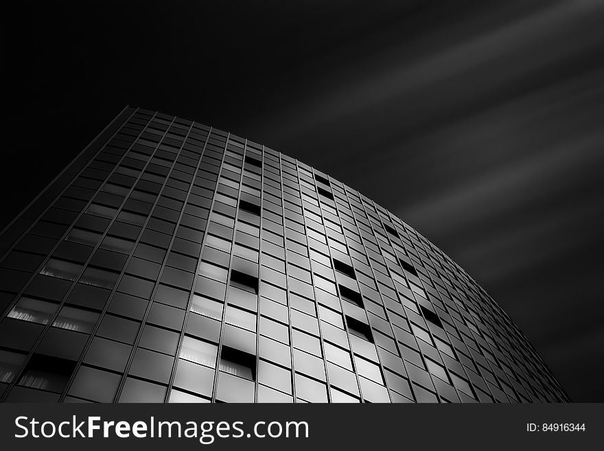 The facade of a modern building in black and white.