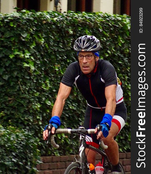 An action photo of a man cycling on a road bike. Cycling is very popular in the Netherlands, as the Netherlands has no hills or mountains. Cycling has become a very efficient, cheap and healthy way of transportation. All my photos can be used for free for your blog, website or business. The photo is CC0 dedicated and therefore copyright free. For daily new free stock photos you can follow me or check my website :&#x29;. An action photo of a man cycling on a road bike. Cycling is very popular in the Netherlands, as the Netherlands has no hills or mountains. Cycling has become a very efficient, cheap and healthy way of transportation. All my photos can be used for free for your blog, website or business. The photo is CC0 dedicated and therefore copyright free. For daily new free stock photos you can follow me or check my website :&#x29;