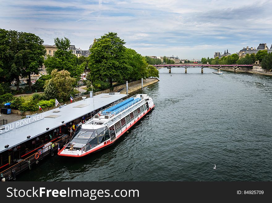 These tour boats cruise the Seine, giving visitors a view of attractions along the river. These tour boats cruise the Seine, giving visitors a view of attractions along the river.