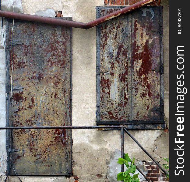 Distressed Wall With Rusty Panels