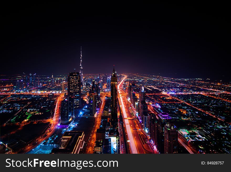 High Rise Buildings during Night Time Photo