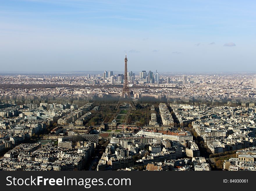 A panoramic view of Paris with the Eiffel Tower in the middle. A panoramic view of Paris with the Eiffel Tower in the middle.