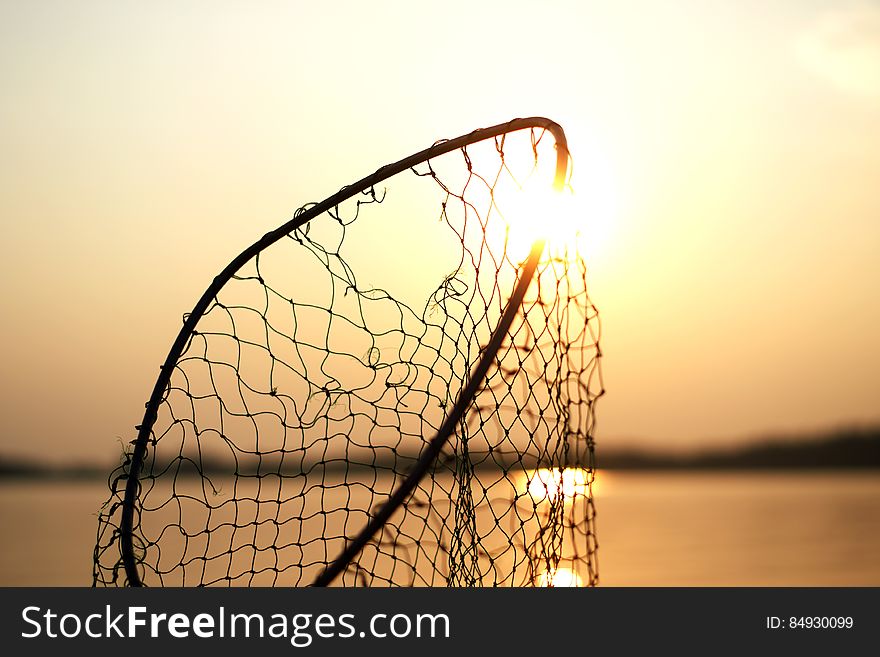 Silhouette of a net during sunset. Silhouette of a net during sunset.