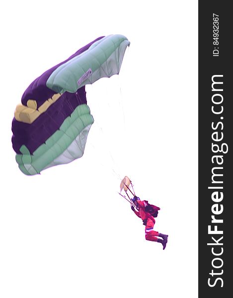 Man Descending On A Parachute