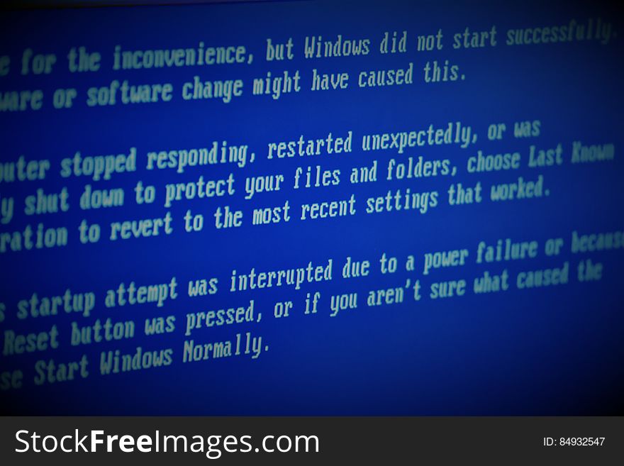 A system error notification on a blue computer screen. A system error notification on a blue computer screen.