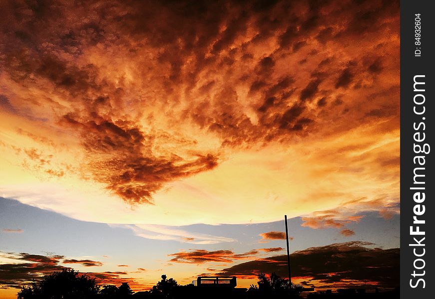 A sunset sky with bright colorful clouds. A sunset sky with bright colorful clouds.