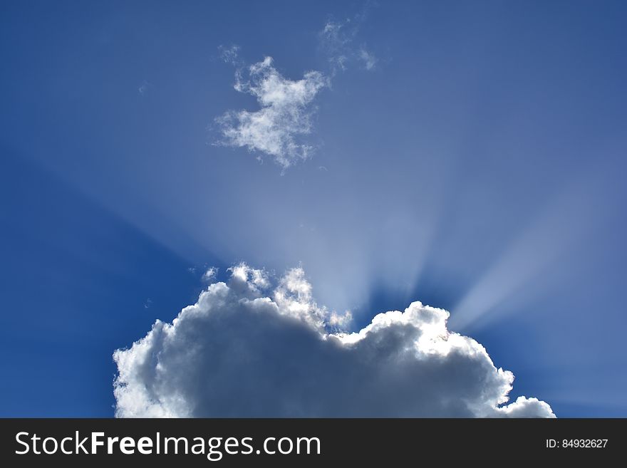 White Cloudy Sky With Sunrays