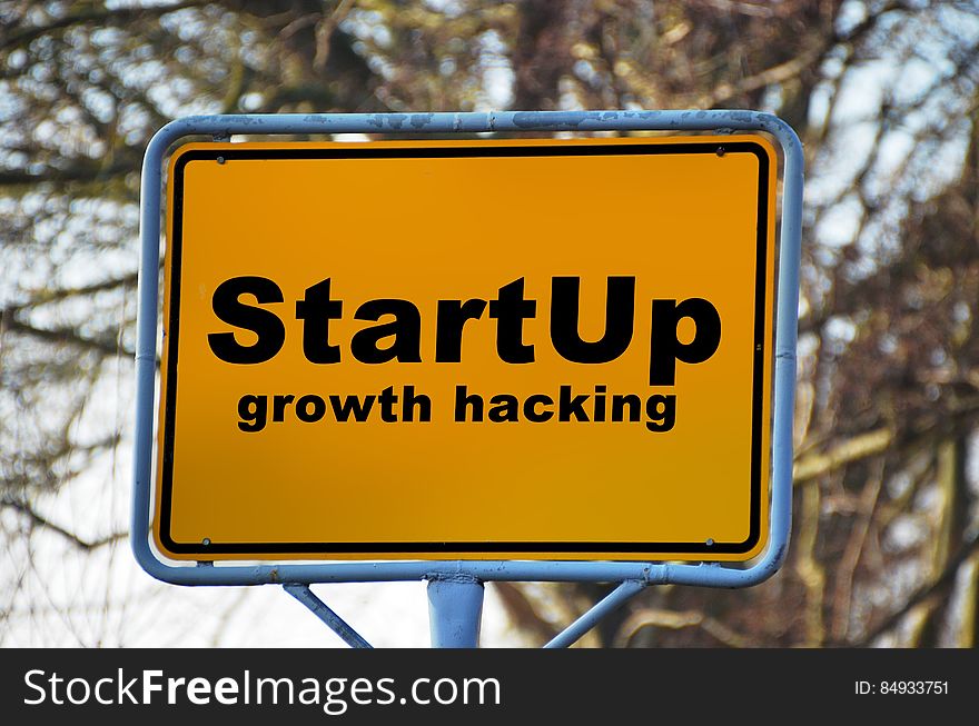 Yellow and Black Start Up Growth Hacking Signage