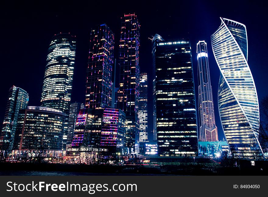 Black Building Lighted Under Clear Sky