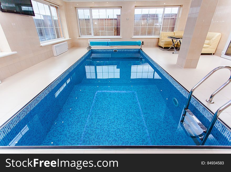 A small indoor swimming pool. A small indoor swimming pool.