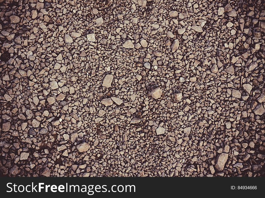 A texture with small pebbles and bigger rocks. A texture with small pebbles and bigger rocks.