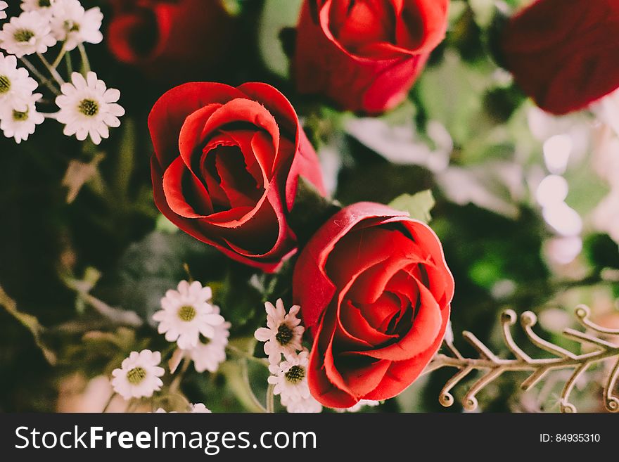 A bouquet with artificial roses and other flowers. A bouquet with artificial roses and other flowers.