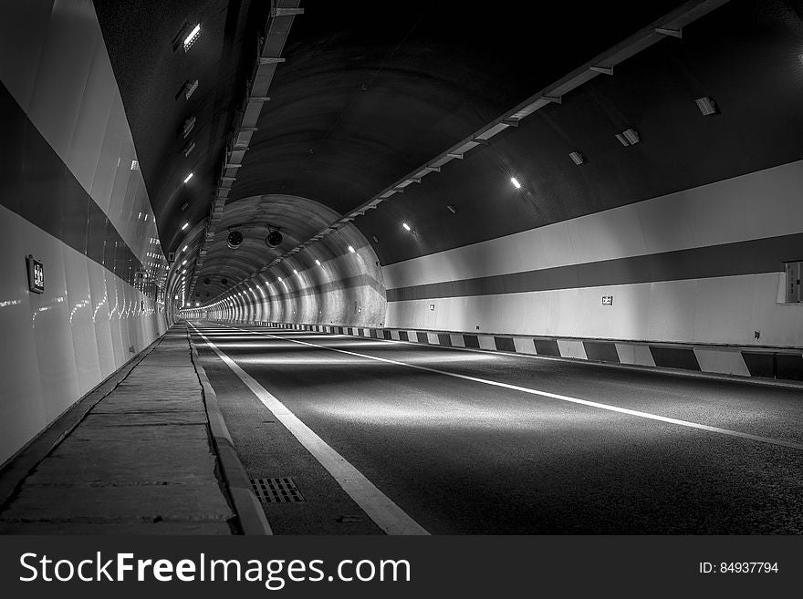 A road passing through a tunnel. A road passing through a tunnel.