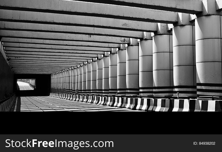 Grayscale Photo Of Concrete Pathway