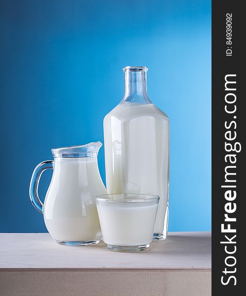 Close-up Of Milk Against Blue Background