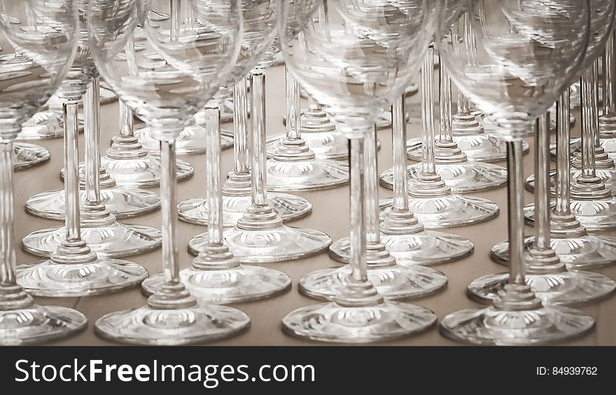 A lot of stemmed wine glasses. A lot of stemmed wine glasses.