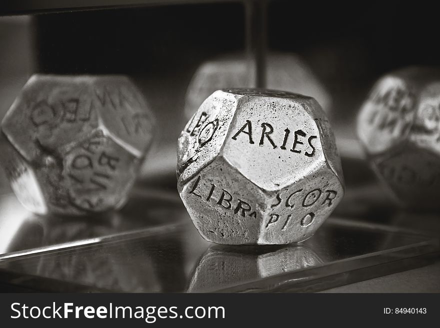 Aries Dice in Gray Scale Photography