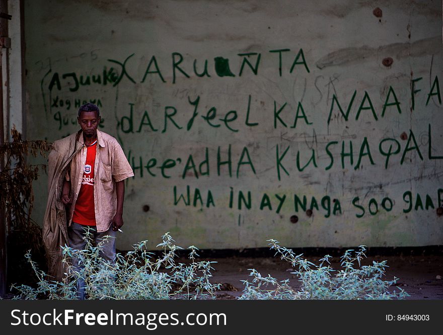 A Somali man stands inside a derelict building in the Abdul-Aziz district of the Somali capital Mogadishu 09 November 2012. The United Nations Security Council on November 7 renewed the mandate of the African Union Mission in Somalia &#x28;AMISOM&#x29; peacekeeping force for a further four months to continue providing support to the Government of Somalia in its efforts to bring peace and stability to the Horn of African country. AU-UN IST PHOTO / STUART PRICE. A Somali man stands inside a derelict building in the Abdul-Aziz district of the Somali capital Mogadishu 09 November 2012. The United Nations Security Council on November 7 renewed the mandate of the African Union Mission in Somalia &#x28;AMISOM&#x29; peacekeeping force for a further four months to continue providing support to the Government of Somalia in its efforts to bring peace and stability to the Horn of African country. AU-UN IST PHOTO / STUART PRICE.