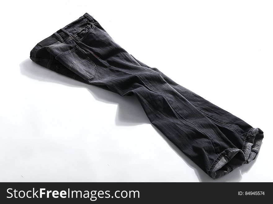 Black Denim Jeans on White Panel