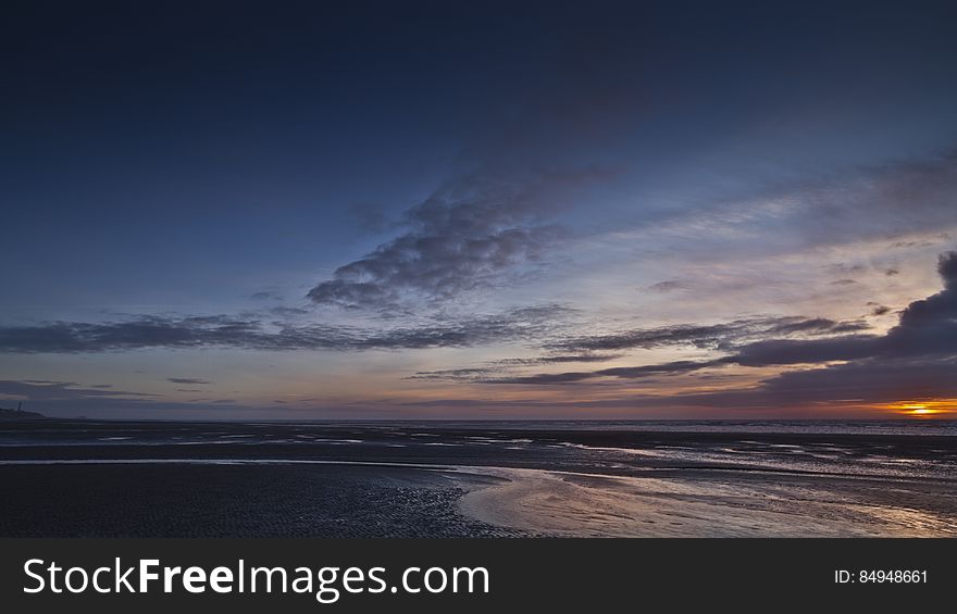 Here is an hdr photograph of a sunset at the beach in Cleveleys looking south towards Blackpool. Located in Cleveleys, Lancashire, England, UK.