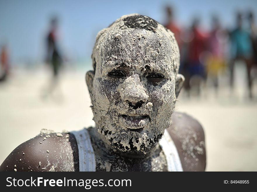 A Somali man, his face covered in sand, enjoys a day out at Lido beach in Mogadishu, Somalia, on January 31. The Mogadishu lifeguards, consisting entirely of a volunteer force of fisherman, began patrolling Lido beach in September 2013 after a spate of drownings. Mogadishu&#x27;s beaches have become a popular destination for the city&#x27;s residents since al Shabab withdrew the majority of its militants from the city in 2011. AU UN IST PHOTO / Tobin Jones. A Somali man, his face covered in sand, enjoys a day out at Lido beach in Mogadishu, Somalia, on January 31. The Mogadishu lifeguards, consisting entirely of a volunteer force of fisherman, began patrolling Lido beach in September 2013 after a spate of drownings. Mogadishu&#x27;s beaches have become a popular destination for the city&#x27;s residents since al Shabab withdrew the majority of its militants from the city in 2011. AU UN IST PHOTO / Tobin Jones