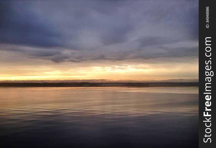 Landscape Of Sunset Over Lake