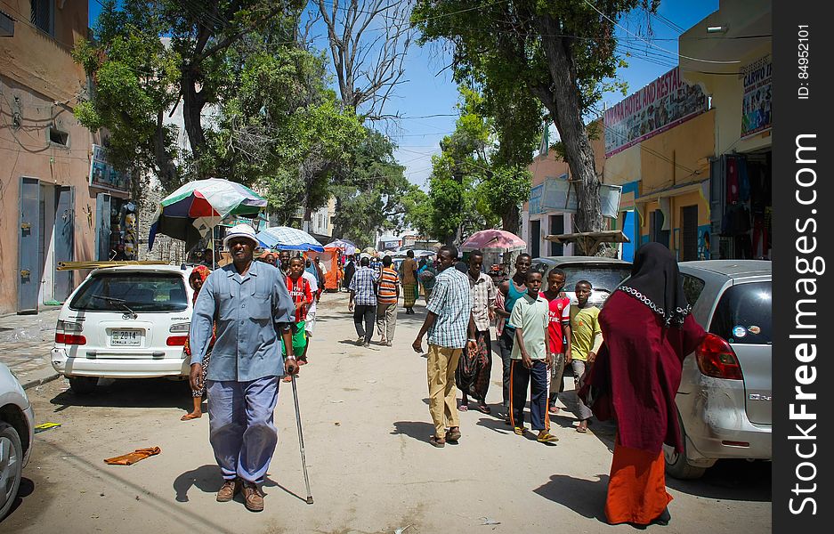 General street scene in Hamar Weyne market in the Somali capital Mogadishu, 05 August, 2013. 06 August marks 2 years since the Al Qaeda-affiliated extremist group Al Shabaab withdrew from Mogadishu following sustained operations by forces of the Somali National Army &#x28;SNA&#x29; backed by troops of the African Union Mission in Somalia &#x28;AMISOM&#x29; to retake the city. Since the group&#x27;s departure the country&#x27;s captial has re-established itself and a sense of normality has returned. Buildings and infrastructure devastated and destroyed by two decades of conflict have been repaired; thousands of Diaspora Somalis have returned home to invest and help rebuild their nation; foreign embassies and diplomatic missions have reopened and for the first time in many years, Somalia has an internationally recognised government.. AU-UN IST PHOTO / STUART PRICE. General street scene in Hamar Weyne market in the Somali capital Mogadishu, 05 August, 2013. 06 August marks 2 years since the Al Qaeda-affiliated extremist group Al Shabaab withdrew from Mogadishu following sustained operations by forces of the Somali National Army &#x28;SNA&#x29; backed by troops of the African Union Mission in Somalia &#x28;AMISOM&#x29; to retake the city. Since the group&#x27;s departure the country&#x27;s captial has re-established itself and a sense of normality has returned. Buildings and infrastructure devastated and destroyed by two decades of conflict have been repaired; thousands of Diaspora Somalis have returned home to invest and help rebuild their nation; foreign embassies and diplomatic missions have reopened and for the first time in many years, Somalia has an internationally recognised government.. AU-UN IST PHOTO / STUART PRICE.