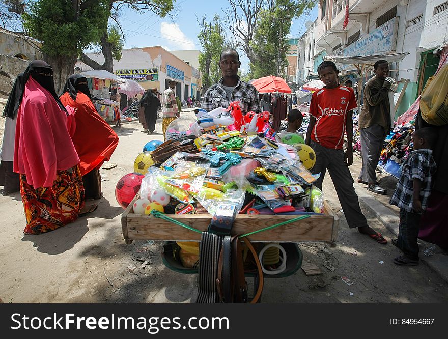A street vendor displays his produce in Hamar Weyne market in the Somali capital Mogadishu, 05 August, 2013. 06 August marks 2 years since the Al Qaeda-affiliated extremist group Al Shabaab withdrew from Mogadishu following sustained operations by forces of the Somali National Army &#x28;SNA&#x29; backed by troops of the African Union Mission in Somalia &#x28;AMISOM&#x29; to retake the city. Since the group&#x27;s departure the country&#x27;s captial has re-established itself and a sense of normality has returned. Buildings and infrastructure devastated and destroyed by two decades of conflict have been repaired; thousands of Diaspora Somalis have returned home to invest and help rebuild their nation; foreign embassies and diplomatic missions have reopened and for the first time in many years, Somalia has an internationally recognised government.. AU-UN IST PHOTO / STUART PRICE. A street vendor displays his produce in Hamar Weyne market in the Somali capital Mogadishu, 05 August, 2013. 06 August marks 2 years since the Al Qaeda-affiliated extremist group Al Shabaab withdrew from Mogadishu following sustained operations by forces of the Somali National Army &#x28;SNA&#x29; backed by troops of the African Union Mission in Somalia &#x28;AMISOM&#x29; to retake the city. Since the group&#x27;s departure the country&#x27;s captial has re-established itself and a sense of normality has returned. Buildings and infrastructure devastated and destroyed by two decades of conflict have been repaired; thousands of Diaspora Somalis have returned home to invest and help rebuild their nation; foreign embassies and diplomatic missions have reopened and for the first time in many years, Somalia has an internationally recognised government.. AU-UN IST PHOTO / STUART PRICE.