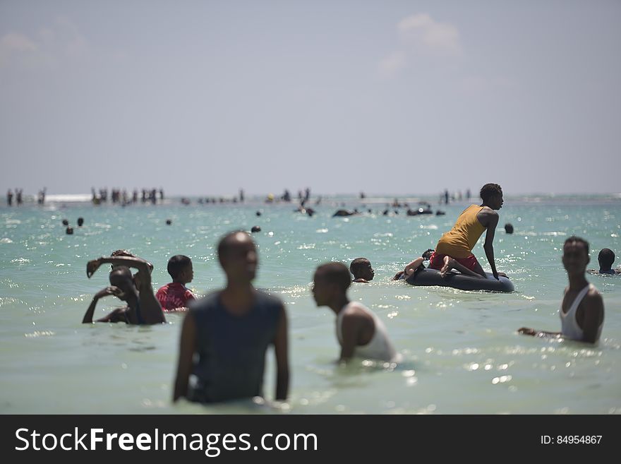 Residents of Mogadishu, Somalia, enjoy the waters off of Lido beach on January 31. The Mogadishu lifeguards, consisting entirely of a volunteer force of fisherman, began patrolling Lido beach in September 2013 after a spate of drownings. Mogadishu&#x27;s beaches have become a popular destination for the city&#x27;s residents since al Shabab withdrew the majority of its militants from the city in 2011. AU UN IST PHOTO / Tobin Jones. Residents of Mogadishu, Somalia, enjoy the waters off of Lido beach on January 31. The Mogadishu lifeguards, consisting entirely of a volunteer force of fisherman, began patrolling Lido beach in September 2013 after a spate of drownings. Mogadishu&#x27;s beaches have become a popular destination for the city&#x27;s residents since al Shabab withdrew the majority of its militants from the city in 2011. AU UN IST PHOTO / Tobin Jones