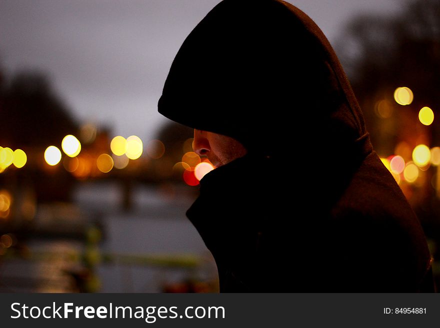 Close Up Photo of Person Wearing Hoodie