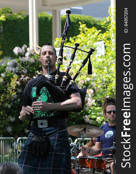 Bagpiper Don Of Nae Regrets Playing From Front