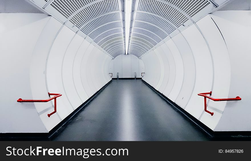 Empty modern white subway tunnel