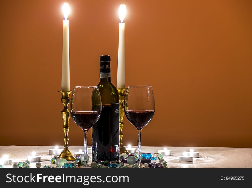 Wines glasses with romantic candles