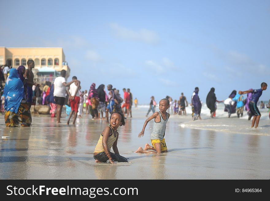 Children play in the ocean on Lido beach in Mogadishu, Somalia, during Eid al-Fitr on July 28. AMISOM Photo / Tobin Jones. Children play in the ocean on Lido beach in Mogadishu, Somalia, during Eid al-Fitr on July 28. AMISOM Photo / Tobin Jones
