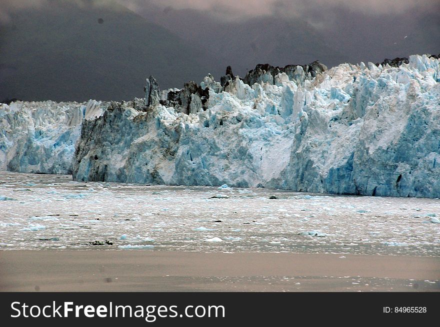 Hubbard Glacier, SE Alaska, largest tidewater glacier in North America, on Disenchantment Bay at head of Yakutat Bay, at the northern end of the Alaskan panhandle. Extending 76 mi &#x28;122 km&#x29; from Mt. Logan in Yukon, the glacier&#x27;s face is more than 6 mi &#x28;9.6 km&#x29; across and some 300 ft &#x28;90 m&#x29; high. It has twice blocked &#x28;1986, 2002&#x29; the mouth of Russell Fjord, making it a lake as high as 90 ft &#x28;27 m&#x29; above sea level. Hubbard Glacier, SE Alaska, largest tidewater glacier in North America, on Disenchantment Bay at head of Yakutat Bay, at the northern end of the Alaskan panhandle. Extending 76 mi &#x28;122 km&#x29; from Mt. Logan in Yukon, the glacier&#x27;s face is more than 6 mi &#x28;9.6 km&#x29; across and some 300 ft &#x28;90 m&#x29; high. It has twice blocked &#x28;1986, 2002&#x29; the mouth of Russell Fjord, making it a lake as high as 90 ft &#x28;27 m&#x29; above sea level.