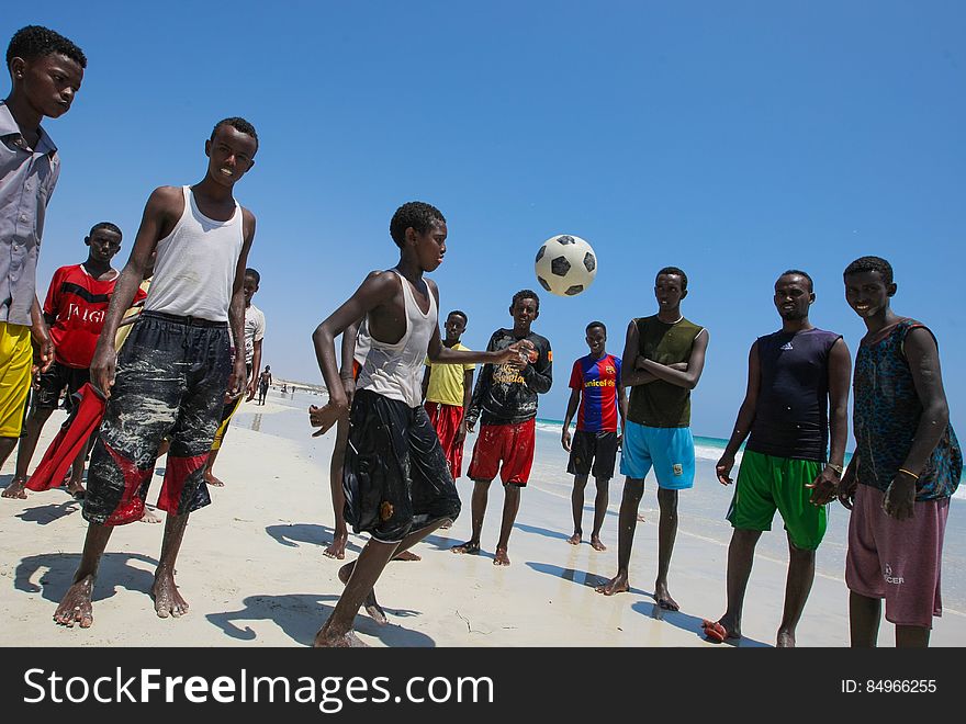 A Somali boy plays &#x27;keep-ups&#x27; with a football as his friends watch on Lido Beach in the Abdul-Aziz district of the Somali capital Mogadishu 09 November 2012. Lido Beach has become a popular spot on Friday&#x27;s with hundreds of Somalis since the withdrawal in August 2011 of the Al-Qaeda affiliated extremist group Al Shabaab who had banned any such social gatherings between men and women. The United Nations Security Council on November 7 renewed the mandate of the African Union Mission in Somalia &#x28;AMISOM&#x29; peacekeeping force for a further four months to continue providing support to the Government of Somalia in its efforts to bring peace and stability to the Horn of African country. AU-UN IST PHOTO / STUART PRICE. A Somali boy plays &#x27;keep-ups&#x27; with a football as his friends watch on Lido Beach in the Abdul-Aziz district of the Somali capital Mogadishu 09 November 2012. Lido Beach has become a popular spot on Friday&#x27;s with hundreds of Somalis since the withdrawal in August 2011 of the Al-Qaeda affiliated extremist group Al Shabaab who had banned any such social gatherings between men and women. The United Nations Security Council on November 7 renewed the mandate of the African Union Mission in Somalia &#x28;AMISOM&#x29; peacekeeping force for a further four months to continue providing support to the Government of Somalia in its efforts to bring peace and stability to the Horn of African country. AU-UN IST PHOTO / STUART PRICE.