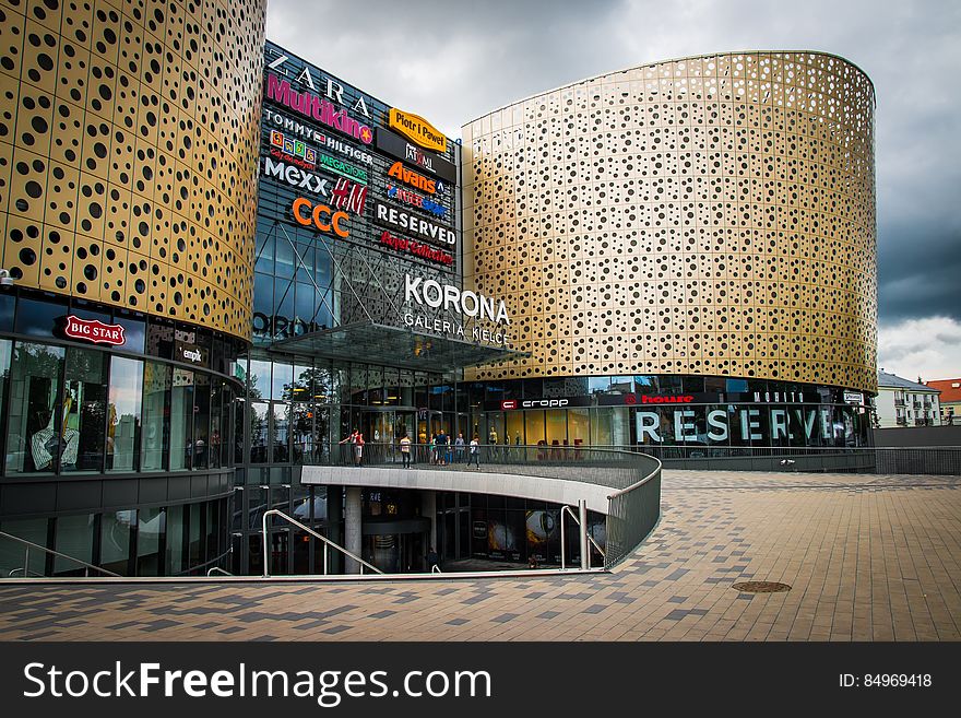 Modern exterior of a shopping mall and advertisements on the facade. Modern exterior of a shopping mall and advertisements on the facade.